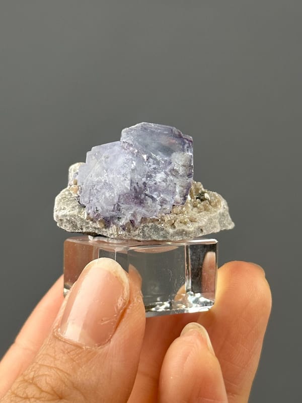 Close-up of etched layered dissolution on purple fluorite