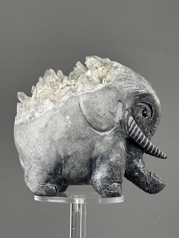 Front view of hand-carved mineral elephant sculpture