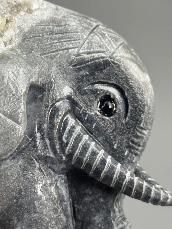 Back view of hand-carved crystal elephant from China