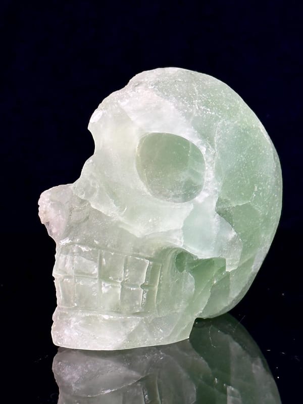 Side profile of fluorite skull geode, 3×1.9×2.4 in