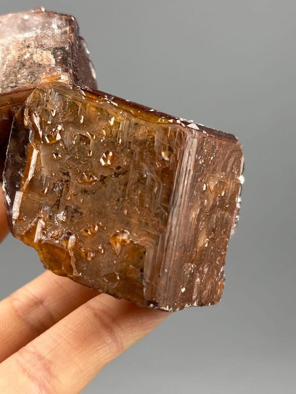 Angled view of twinned chocolate calcite specimen