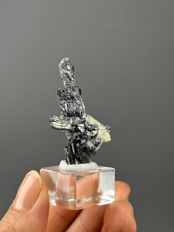 Sb₂S₃ stibnite on BaSO₄ barite, orthorhombic, Hunan, 0.35 oz