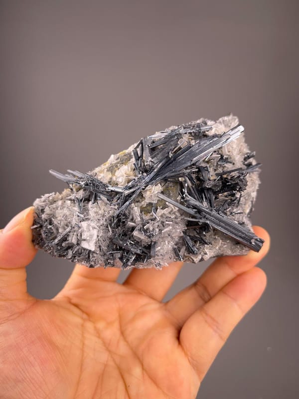 Stibnite cluster with barite from Lengshuijiang, Hunan, China