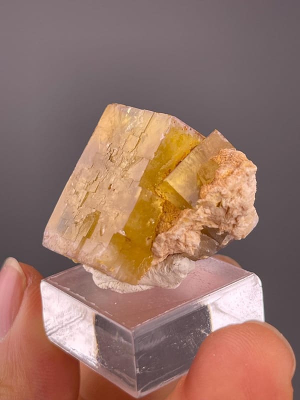 Light through yellow fluorite cube showing clarity
