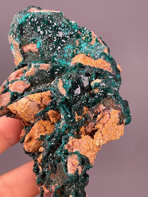 Copper silicate dioptase with emerald green color on matrix