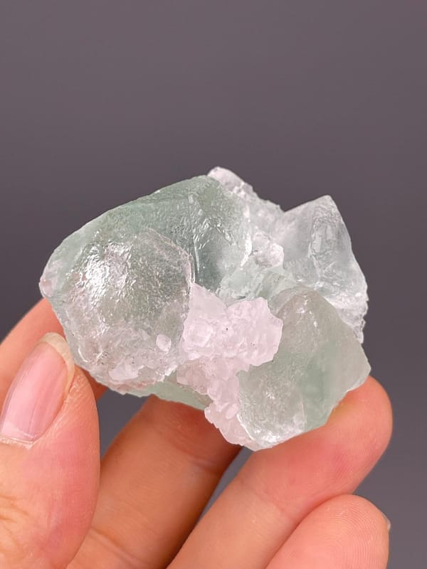 Rare mint green fluorite with calcite association, China