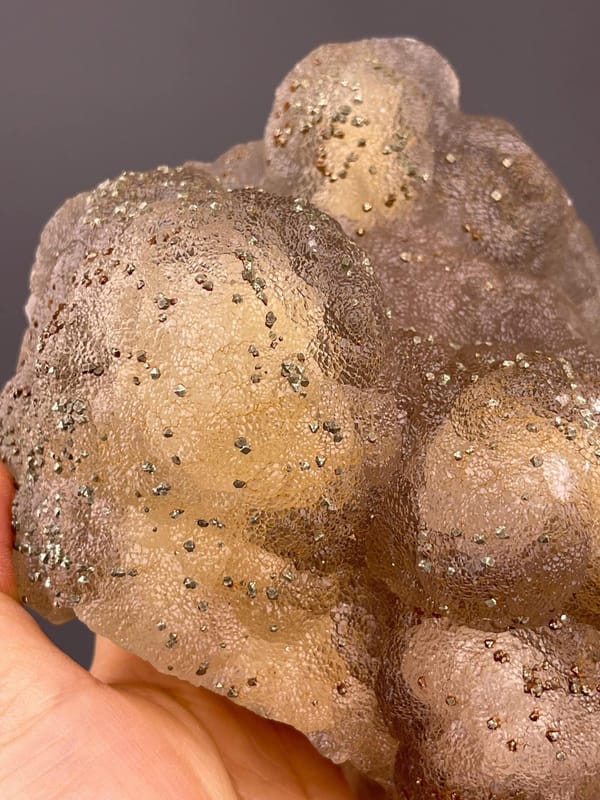 Side view of botryoidal fluorite showing globular formations