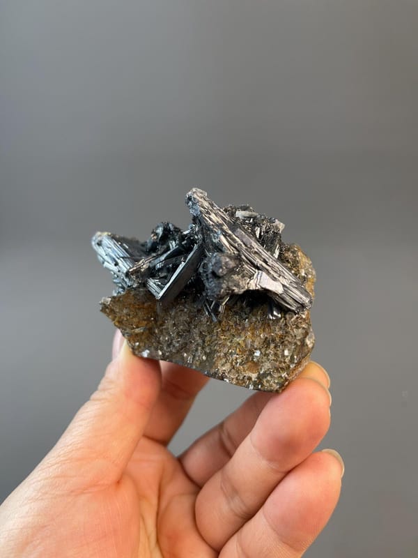 Side view of stibnite Sb2S3 crystal cluster, Hunan