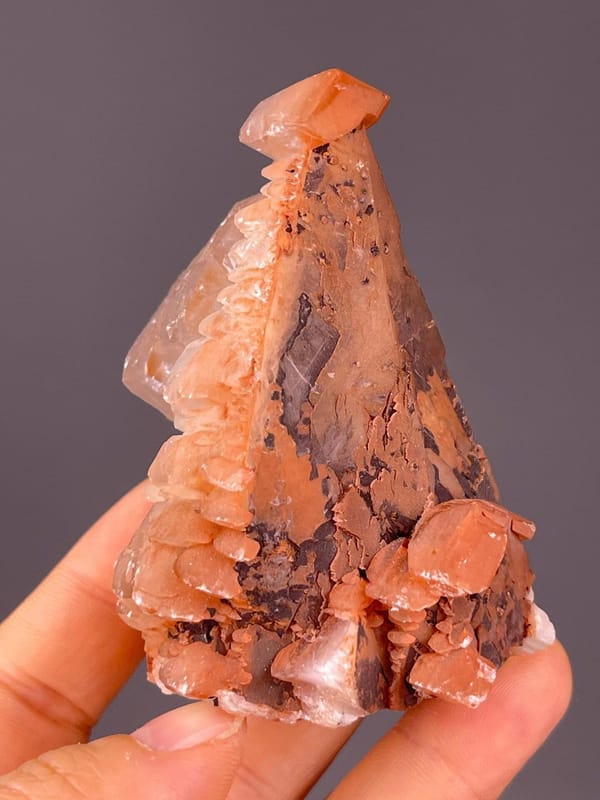 Side view of red-brown scalenohedral calcite tower, Hubei
