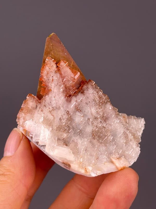 Calcite CaCO3 trigonal tower on white blade matrix