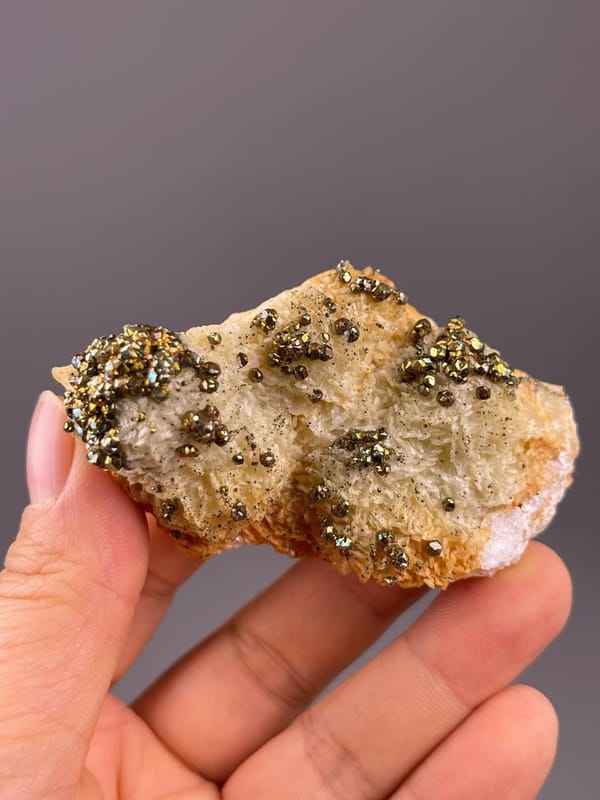 Iridescent chalcopyrite color on pyrite matrix