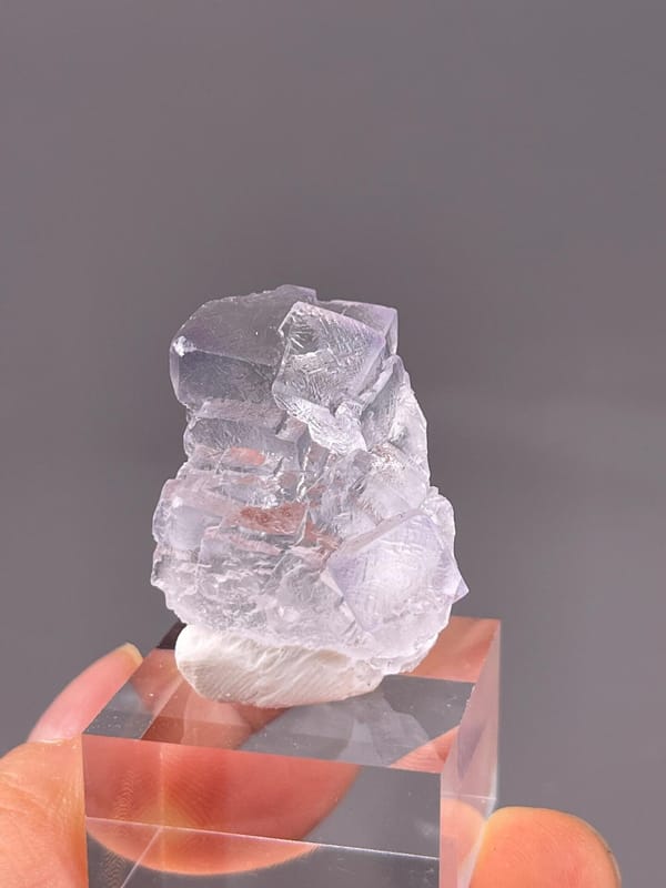 Transparent fluorite with dissolved etched surface texture