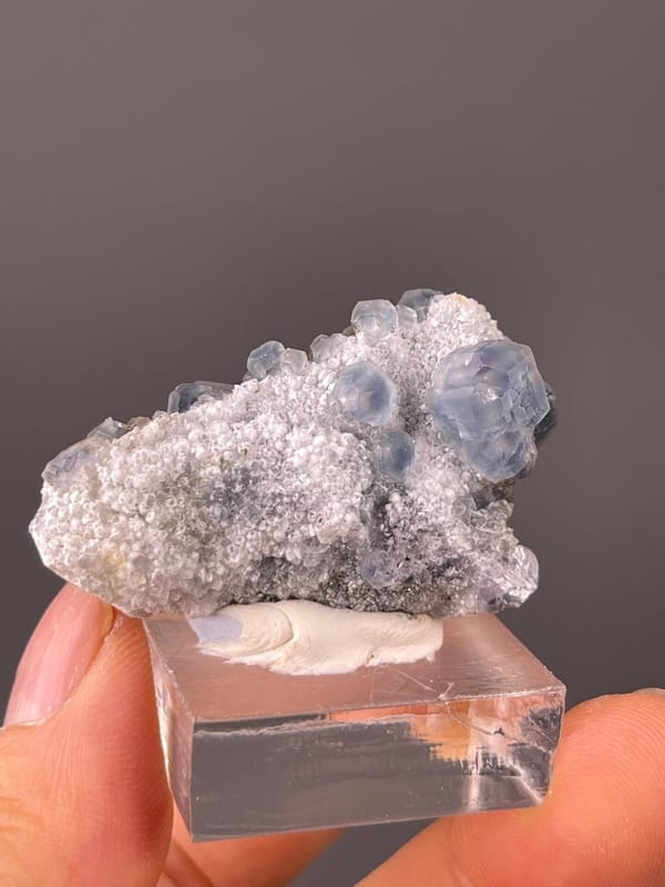 Front view of tanzanite-blue fluorite cluster from Fujian