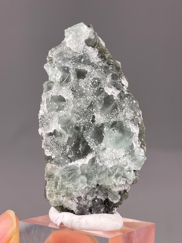 Side view of sugar-coated green fluorite cluster