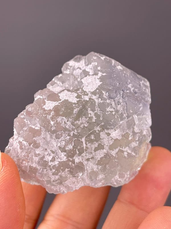 Top view of frosted quartz overgrowth on fluorite