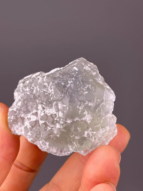 Green sugar fluorite under studio lighting