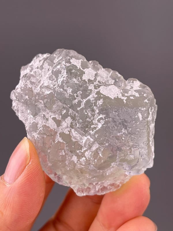 Sparkling layer of fine quartz on green fluorite