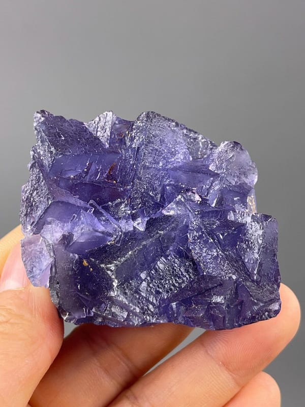 Scale reference of deep purple fluorite cluster from Guizhou