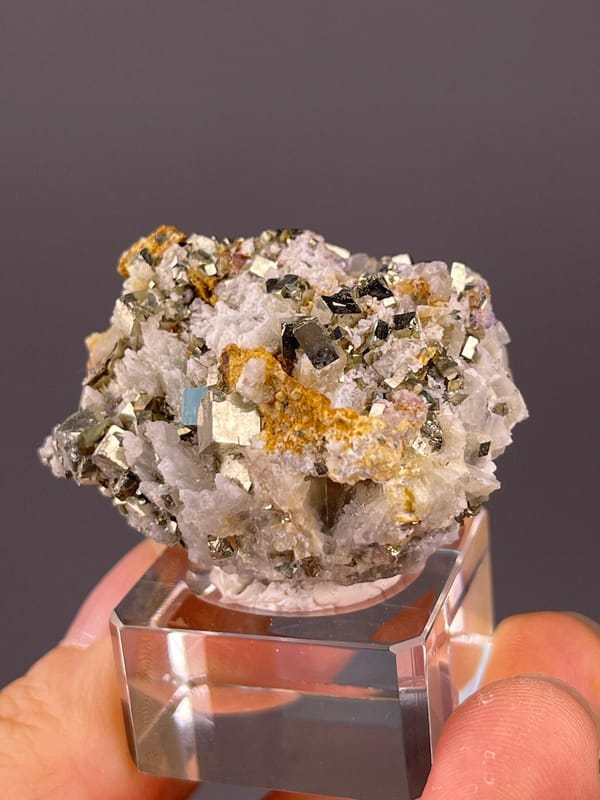 Side view of pyrite cluster showing crystal density