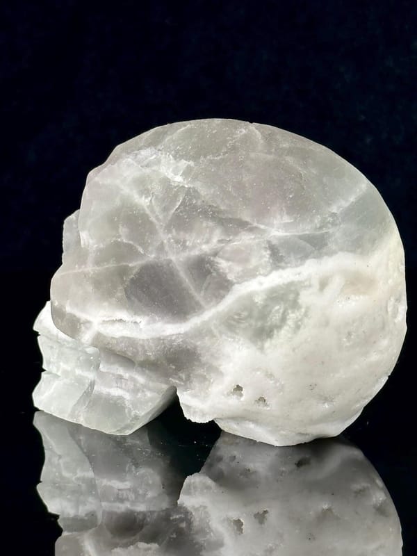 Three-quarter angle of green fluorite crystal skull