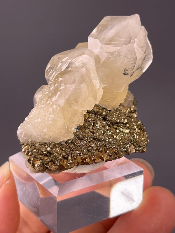 CaCO₃ on FeS₂, trigonal calcite on pyrite, Chenzhou, 2.12 oz