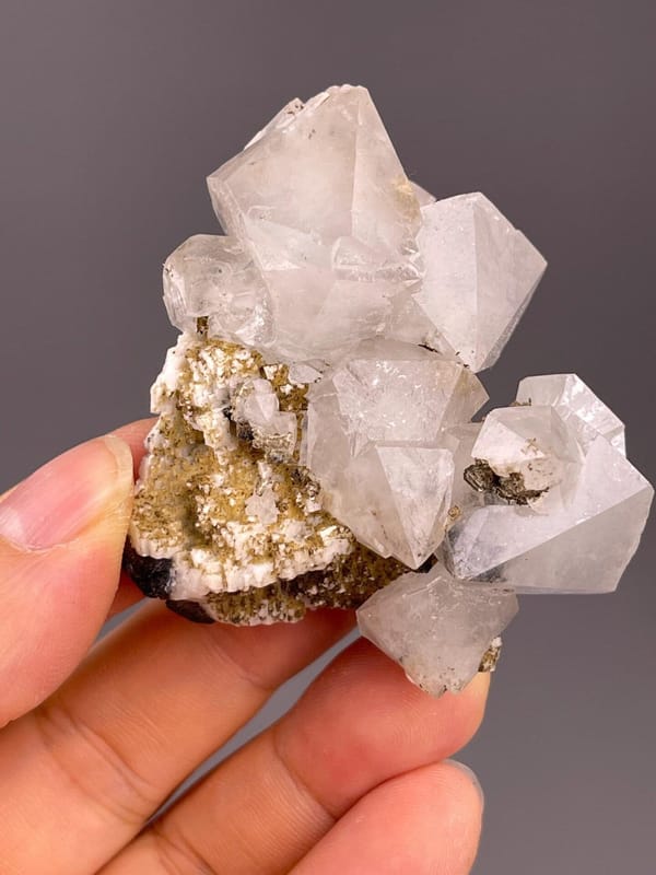 Angled view of white fluorite octahedron