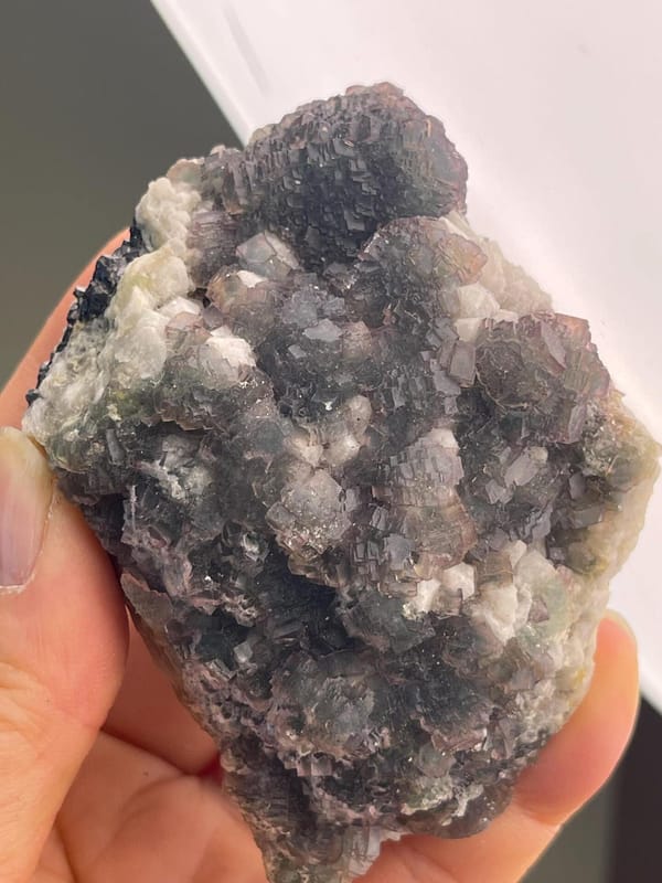 Two-tone fluorite cluster displaying vitreous luster