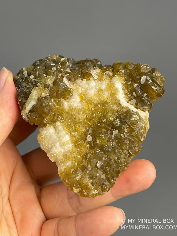 Golden barite crystals complemented by creamy white calcite
