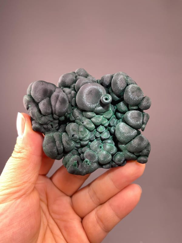 Side view of malachite botryoidal cluster from Yangchun