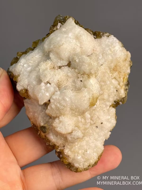 Close-up of golden barite BaSO4 with white calcite, Jiangxi
