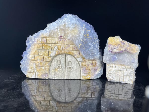Top view of blue and gold calcite house sculpture set