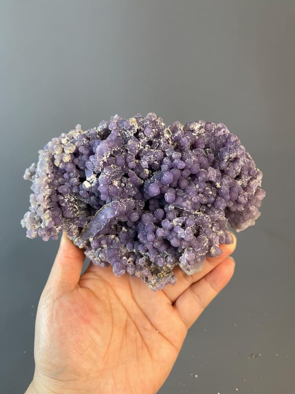 Large grape agate cluster displaying waxy luster
