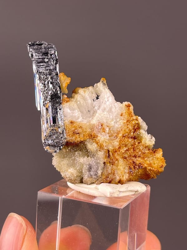 Close-up of prismatic stibnite habit on natural matrix