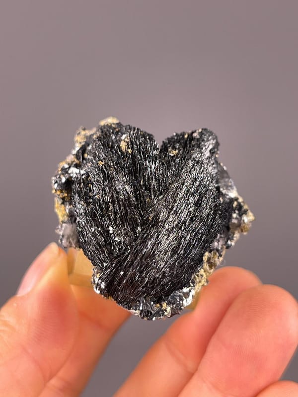Brilliant metallic sheen of specular hematite from Inner Mongolia