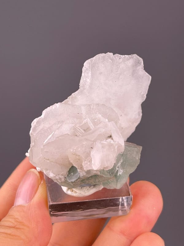 Translucent green fluorite with calcite mineral association