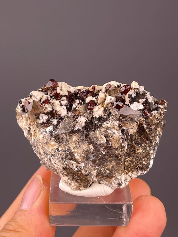 Garnet with feldspar and smoky quartz from Fujian, China