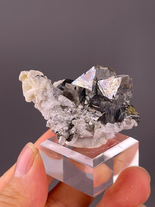 Arsenopyrite crystals with quartz and calcite matrix