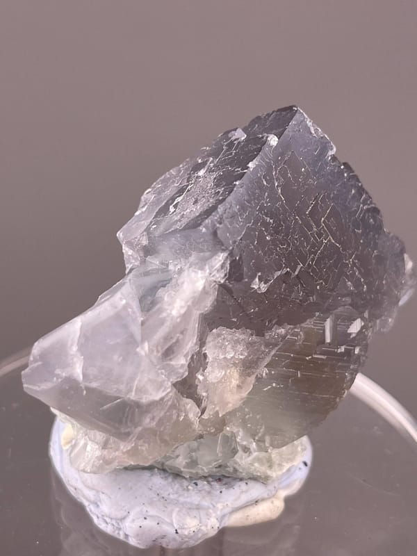 Purple and blue coloration on etched fluorite crystal