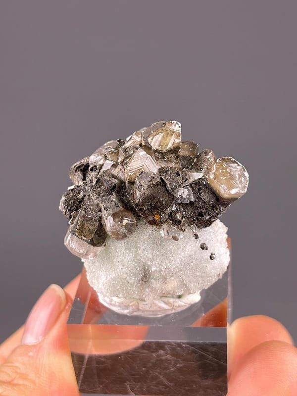 Close-up of green fluorite crystals on skarn matrix