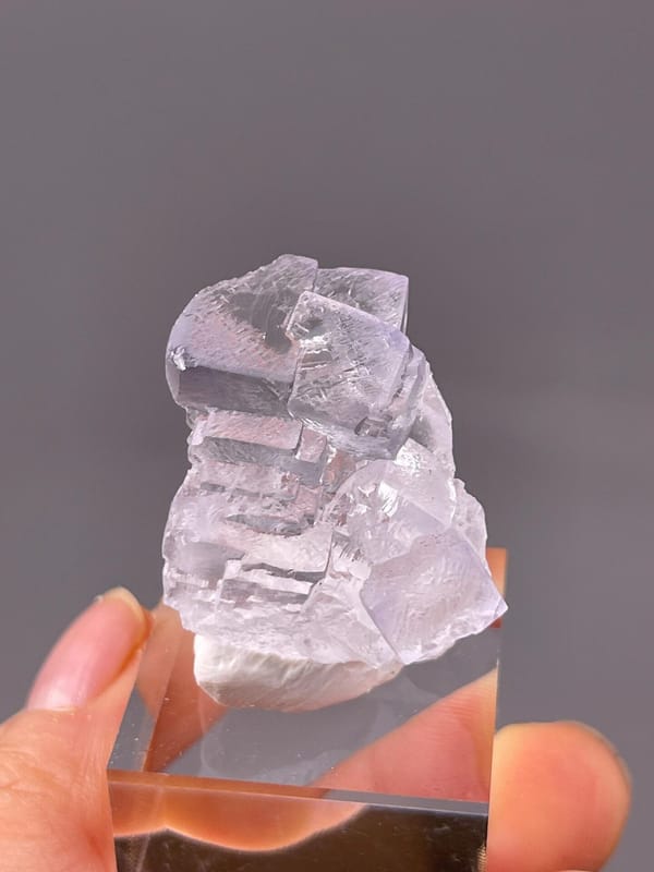 Transparent fluorite crystal with natural etch patterns