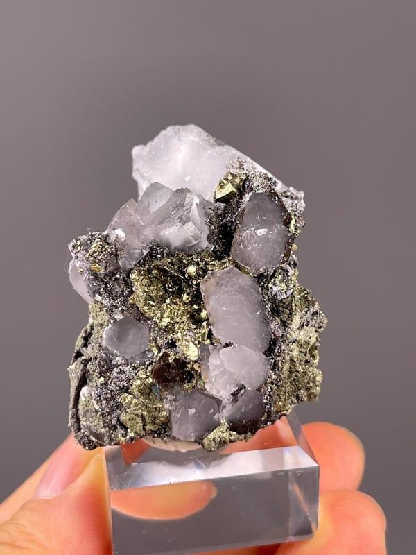 Front view of colorless fluorite with pyrite from Hunan