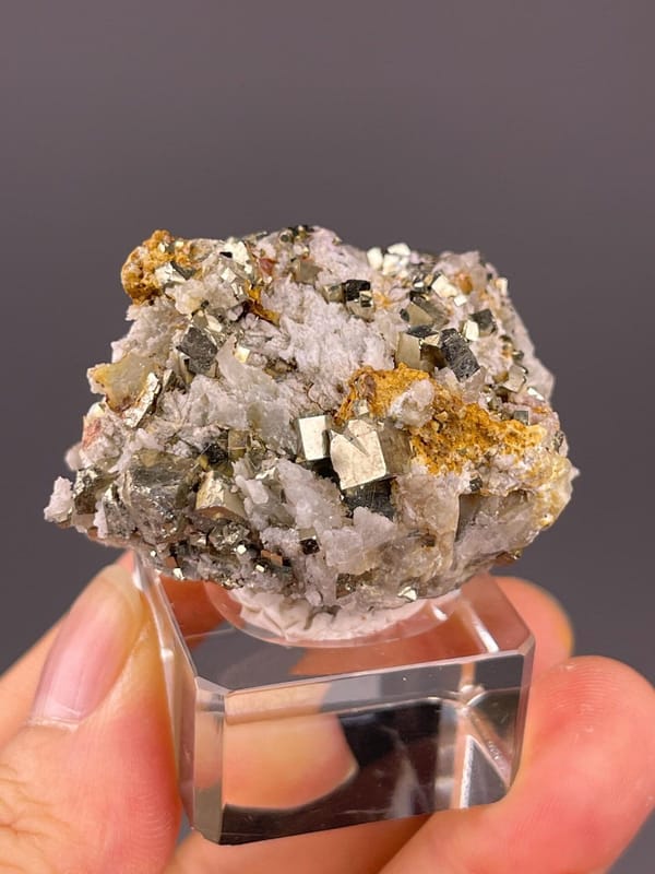Front view of cubic pyrite cluster from Spain