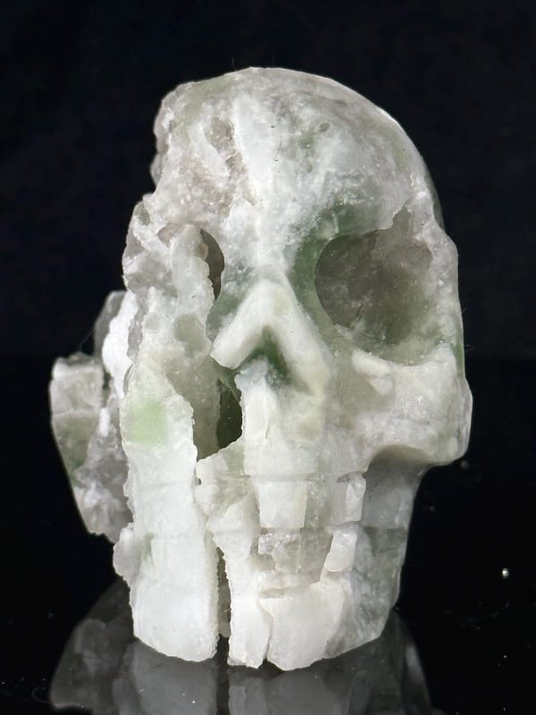 Front view of hand-carved green fluorite skull