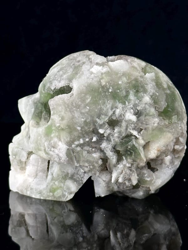 Scale reference of large green fluorite skull 3.4 inches