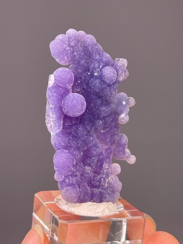 Front view of vivid purple grape agate from Mamuju
