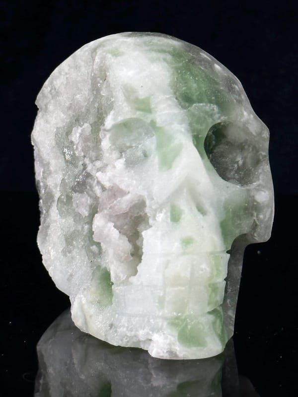 Front view of hand-carved green fluorite skull