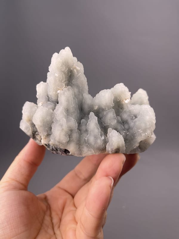 Smooth matte quartz surface detail showing interlocking botryoids