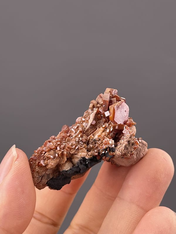 Angled view of Mibladen vanadinite highlighting deep red colour