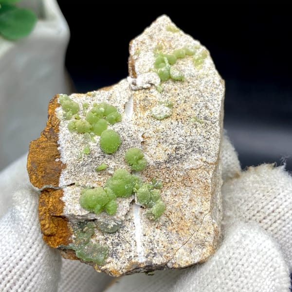 Apple-green pyromorphite balls on pale sandstone plate from Guangxi, China, view 9 of 9