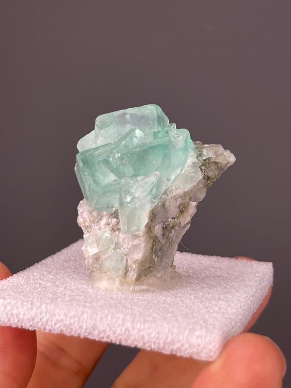 Aqua Blue-Green Fluorite specimen from Yaogangxian Mine, Hunan, China presenting mint-green intergrown cubes